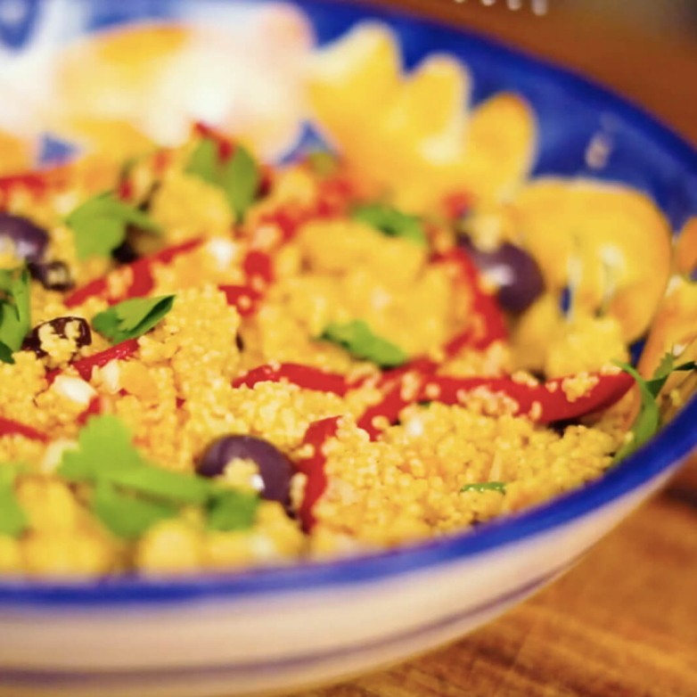 Couscous salad with Mixed Olives in a toasted Cumin, Chili and Orange Oil
